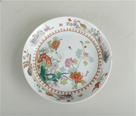 A porcelain famile rose plate with decoration of various birds and flowers,...