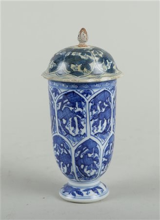 A porcelain bell-shaped covered vase with floral decoration in borders....