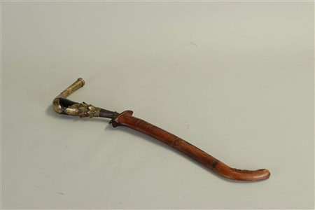 A rare Indonesian damask forged 'Rentong' knife (Bade-Bade) with a horn...