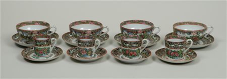 A set of four porcelain tea cups and saucers and four coffee cups and...