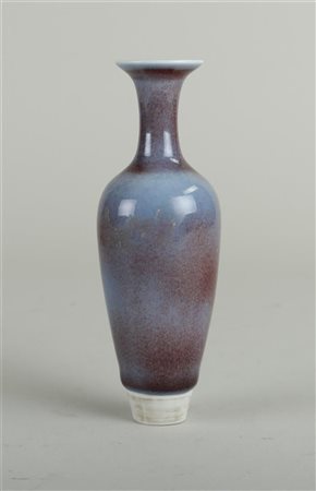 A porcelain sang de bouef collar vase and stand, marked Kangxi. China, 20th...