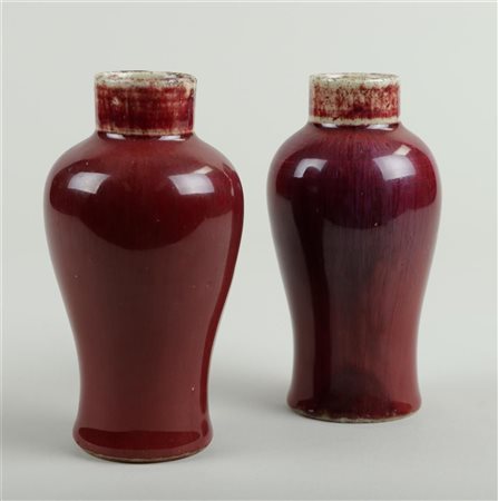 Two Sang de boeuf baluster vases. China, 18th century.H. 13,5 cm.