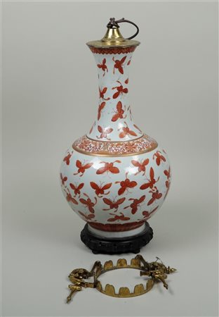 A porcelain iron red decoration of butterfly converted into lamp base. China,...