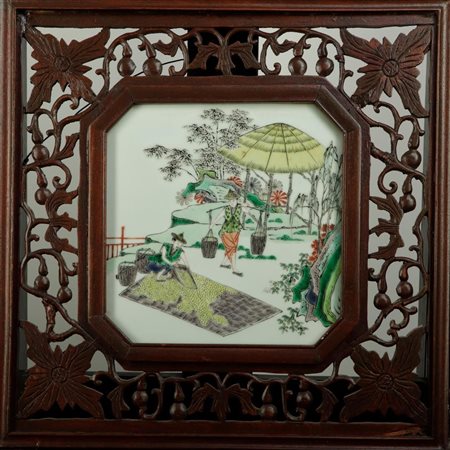 A porcelain famille vertre plaque with decoration of working figures. China,...