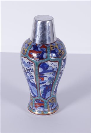 A porcelain vase decorated with landscape decor in beds. China, Kangxi.H. 27 cm.