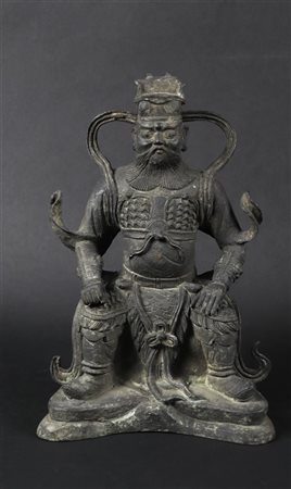 A bronze figure of a warrior. China, Ming?H. 25 cm.