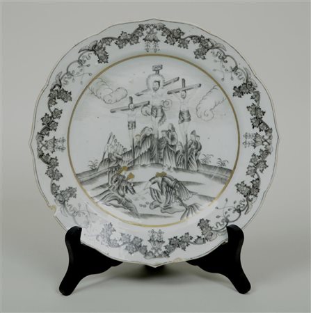 A porcelain encre de Chine plate with religious image. China, 18th century....