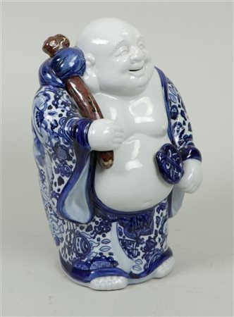A Kutani figure of a Hotei, signed on the bottom. Japan, 20th century.H. 29,5...