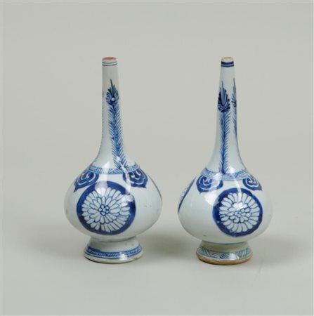 Two porcelain sprinklers decorated with peonies. China, Kangxi. Restored.H....