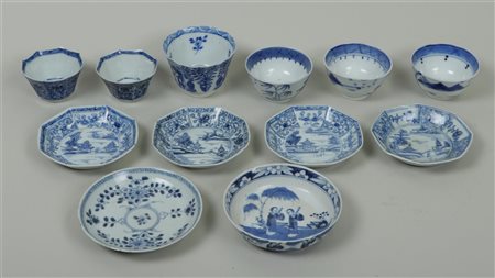 A collection of various cups and saucers with floral motifs and various...