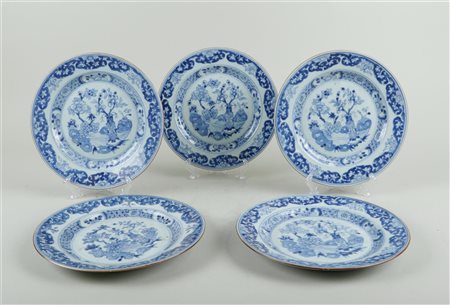 Five porcelain plates with decoration of flower vase on tobacco leaf decor....