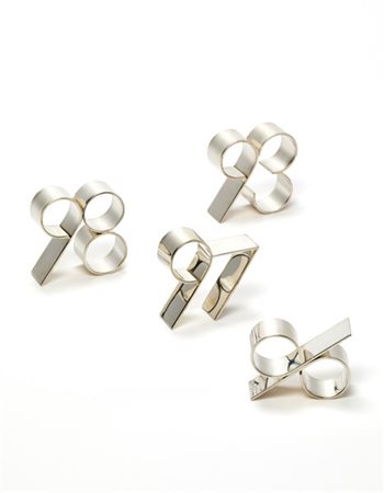 San Lorenzo Quattro segnaposto in argento. Milano, seconda metà secolo XX. Titol