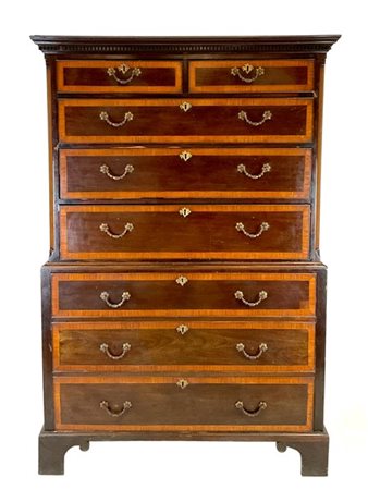 Mobile cassettiera a due corpi impiallacciato in mogano e filettato in legni va