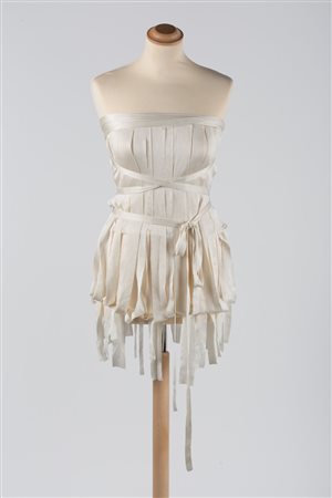 Gucci 2002A very light viscose knit top in a natural white...
