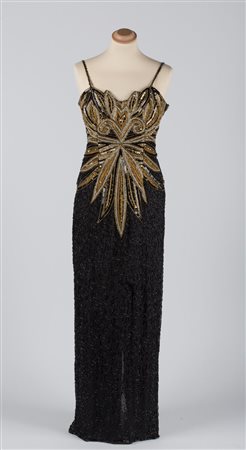 A tailor-made evening dress 1930&#39;sA black floor-length evening dress with...