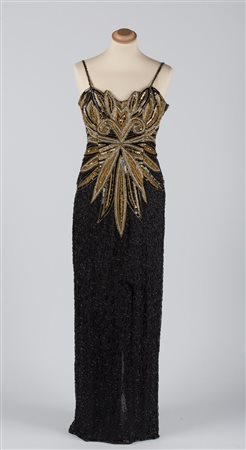 A tailor-made evening dress 1930'sA black floor-length evening dress with...