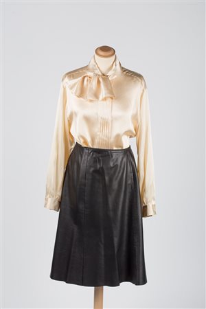 Gucci 1980&#39;sA outfit consisting of a cream-coloured silk&nbsp;blouse and...