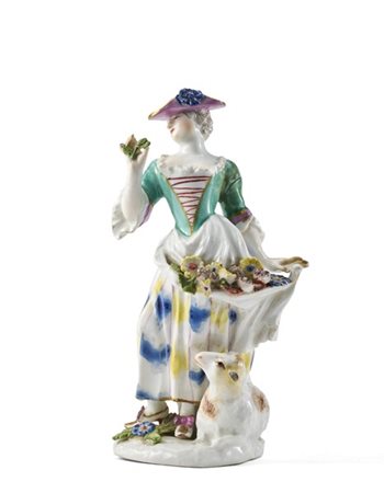 Manifattura di Meissen, secolo XVIII. Figura di pastorella con fiori e pecora i