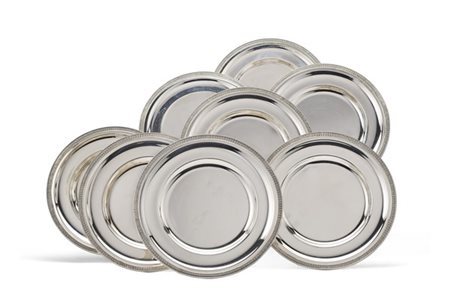 Otto piattini in argento con profilo a foglie lanceolate. Alessandria, argenter