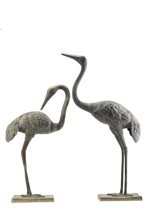 Coppia di gru in bronzo su base quadrata (h. max cm 73) (difetti)
