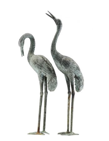 Coppia di gru in bronzo (h. max cm 81) (difetti e restauri)