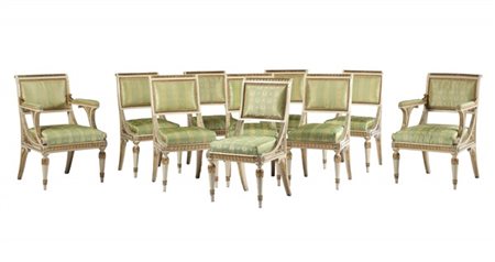 Gruppo di otto sedie e coppia di poltrone in legno intagliato, dipinto e dorato