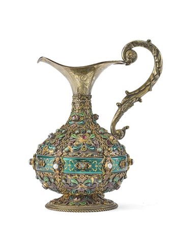 Versatoio in argento dorato, inciso e riccamente decorato da smalti, smeraldi c