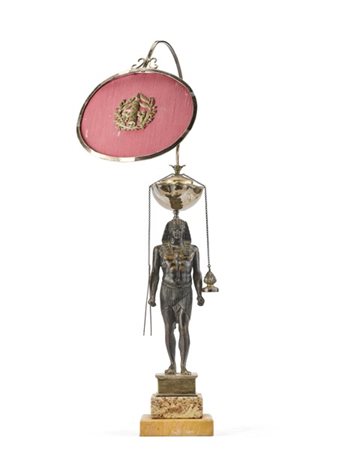 Lucerna in argento con sostegno a figura egizia in bronzo brunito reggente vasc