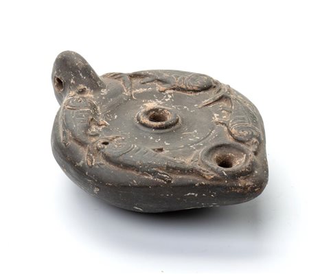 Lucerna in ceramica con decoro paleocristiano a sequenza di pesci   