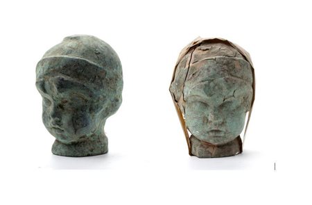 Lotto di due teste di bambino in terracotta   