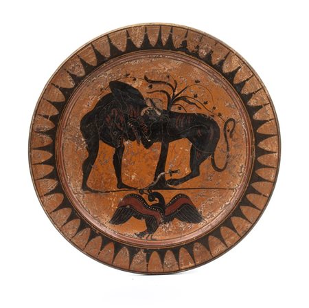 Disco in ceramica arcaica a figure nere raffigurante una delle fatiche di Ercole, ovvero la Vittoria sul Leone di Nemea   