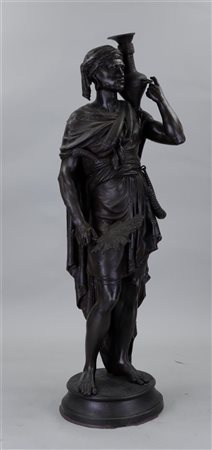 A large zamac sculpture of an Arab, made into a lampshade. Damaged at the...