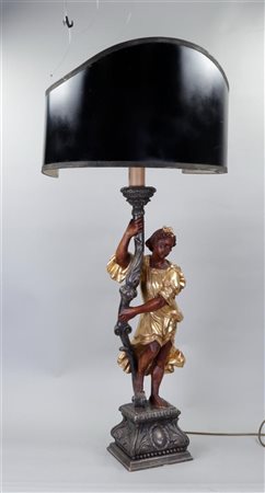A partly polychrome lamp in the shape of a classicist lady.H. 75 cm (ex kap).