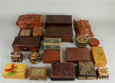 A large lot of woodwork including storage boxes with various decorations.