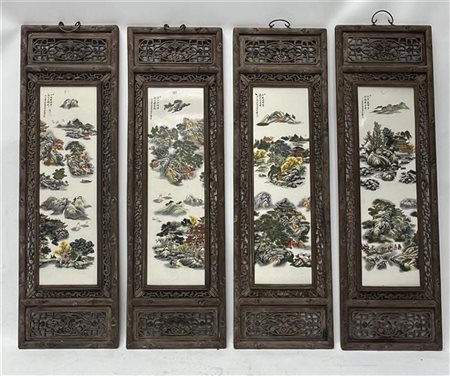 A set of four large Chinese porcelain plaques with landscape decoration in...