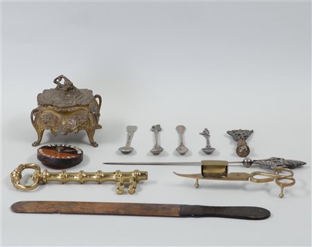 A collection of miscellaneous items including a game converter, jewelry box,...