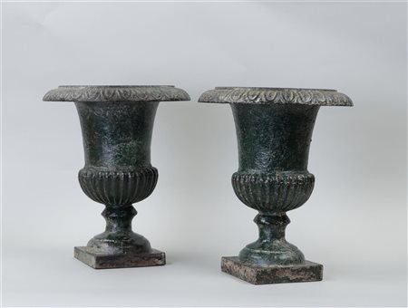 A set of cast iron polychrome garden vases. H. 24 cm.