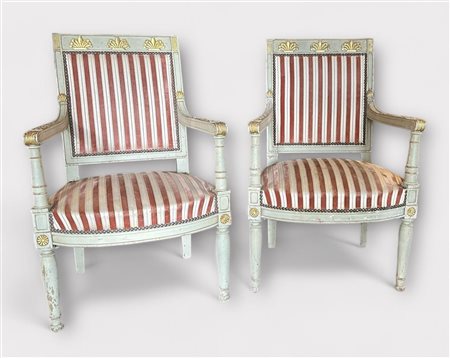 A set of (2) grey lacquered Louis XVI style chairs with gilded details and...