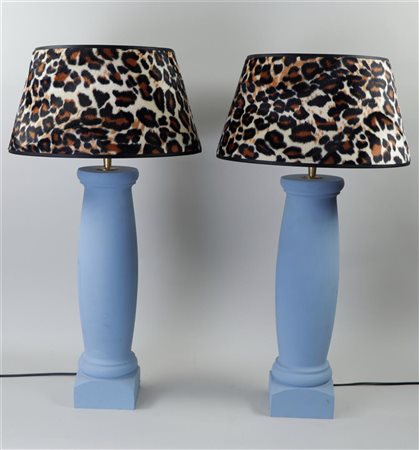 A set of wooden painted columns, converted into screen lamps. H. 68 cm.