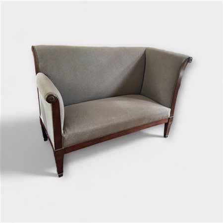 A high back mahogany bench. The legs set in brass brackets, England late 18th...