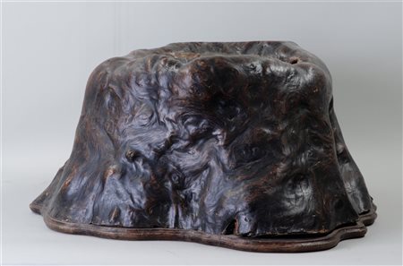 An antique terracotta cachepot in the shape of a tree stump. 19th century. 40...