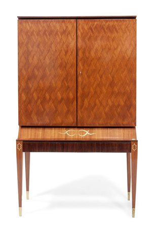 BUFFA PAOLO Mobile bar in legno di palissandro e decori in ottone. Anni '50...