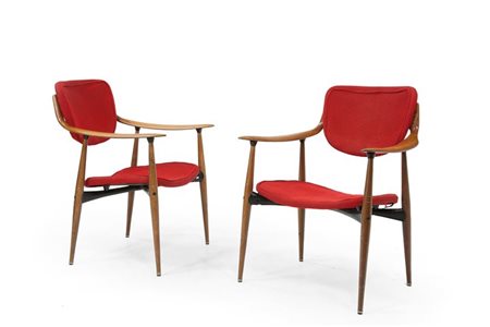 PRODUZIONE SVEDESE Coppia di poltrone in legno di teak curvato, metallo...