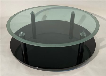 Grande tavolo basso circolare con piano in cristallo con bordo sabbiato e strut