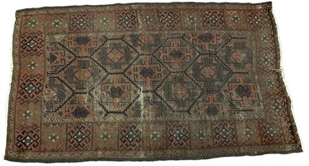 Tappeto Beluchistan, Persia, fine secolo XIX. Decoro a griglia nei toni del ros