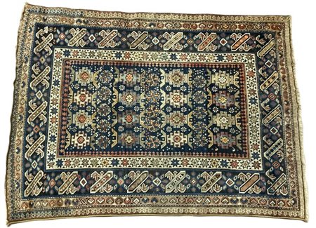 Tappeto Chi-Chi, Caucaso, secolo XX. Decoro con piccoli medaglioni in file geom