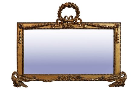 Caminiera in legno intagliato e dorato con decori applicati a festoni, aquile c