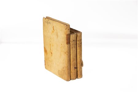 Lotto di tre volumi in pergamena   