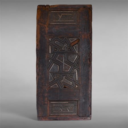 A carved wooden panel