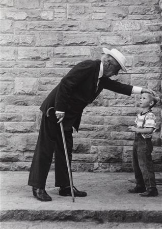 Tony Vaccaro (1922-2022)  - Frank LLoyd Wright caressing a child, 1950s